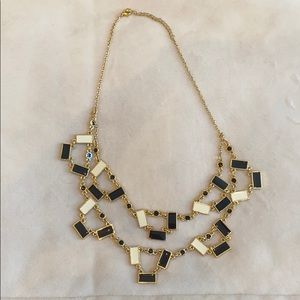 Black, white and gold necklace, trunk club